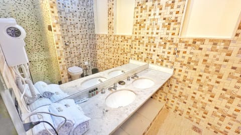 Deluxe Triple Room, 1 Queen Bed with Sofa bed, Mountain View | Bathroom | Shower, designer toiletries, hair dryer, slippers