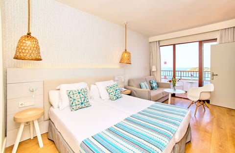 Deluxe Room, Sea View (Quadruple) | Minibar, in-room safe, desk, free WiFi