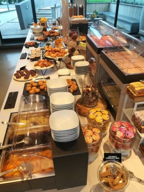 Daily buffet breakfast (EUR 18 per person)