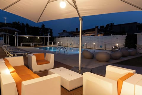 Outdoor pool, open 8 AM to 7 PM, pool umbrellas, sun loungers