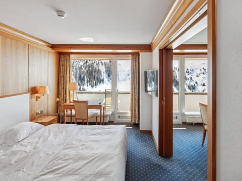 Deluxe Suite, Balcony, Mountain View | Desk, laptop workspace, blackout drapes, free WiFi