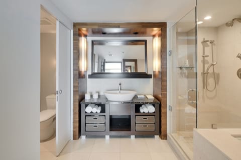 Separate tub and shower, deep soaking tub, designer toiletries