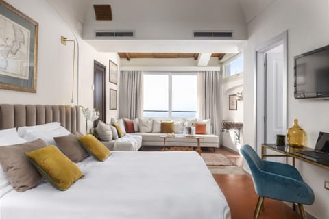 Deluxe Room, Sea View (Sea and Etna View  Multiple Beds) | Minibar, in-room safe, desk, soundproofing