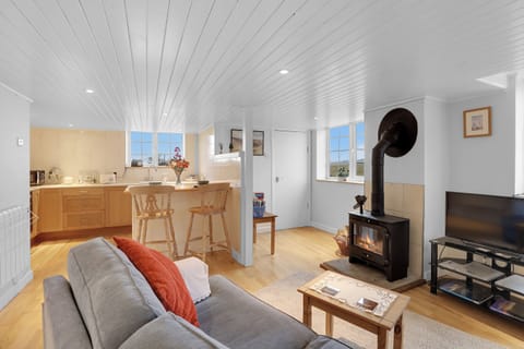 Cottage | Living area | 30-inch TV with satellite channels