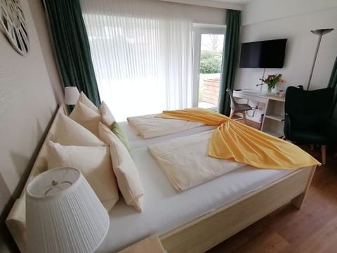 Hypo-allergenic bedding, in-room safe, desk, laptop workspace