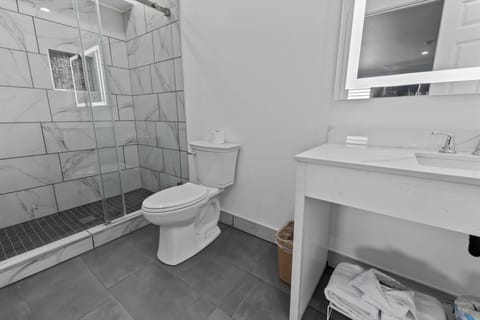 Shower, towels, soap, shampoo