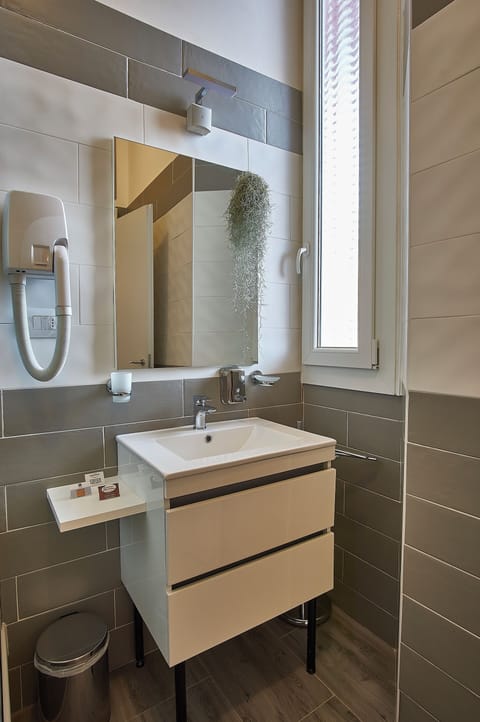 Basic Apartment, 1 Queen Bed with Sofa bed | Bathroom | Shower, hair dryer, towels, soap