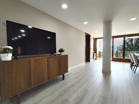 Comfort Apartment, City View | Living area | 32-inch LED TV with digital channels