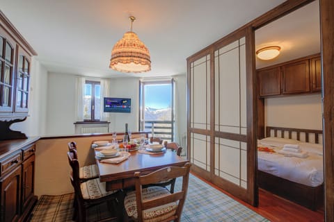 Family Apartment, 2 Bedrooms (Appartamento Principino 24 Ski in Ski) | Dining