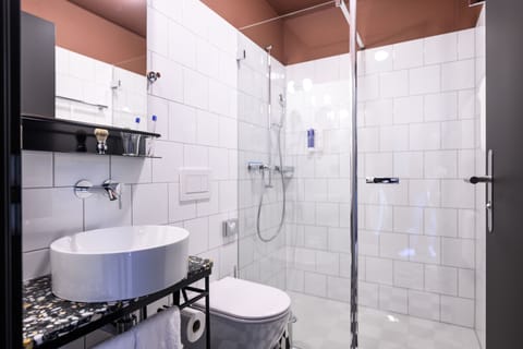 Shower, hair dryer, slippers, heated floors