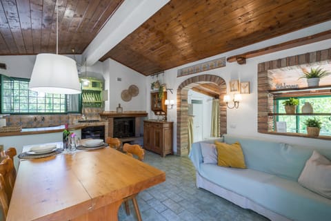 Villa, Garden View | Living area | 32-inch flat-screen TV with satellite channels