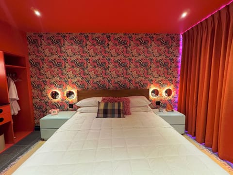 Premium bedding, blackout drapes, iron/ironing board, free WiFi