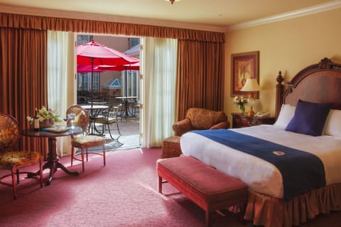 Premier Room, 1 King Bed, Patio, Courtyard Area | Egyptian cotton sheets, premium bedding, down comforters, pillowtop beds