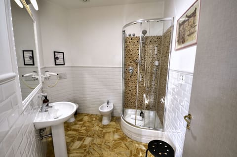 Superior Quadruple Room, City View | Bathroom | Shower, hair dryer, towels, soap