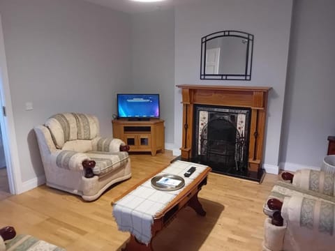 House | Living area | TV, fireplace