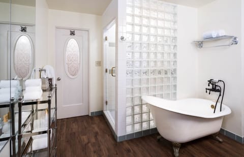 Premier Suite | Bathroom | Designer toiletries, hair dryer, bathrobes, towels