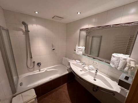 Hair dryer, towels, soap, shampoo