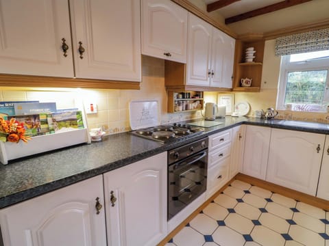 Fridge, electric kettle, toaster, cookware/dishes/utensils