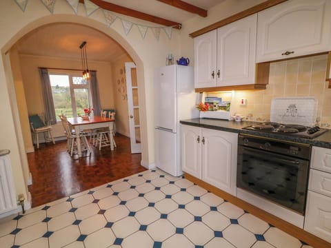 Fridge, electric kettle, toaster, cookware/dishes/utensils