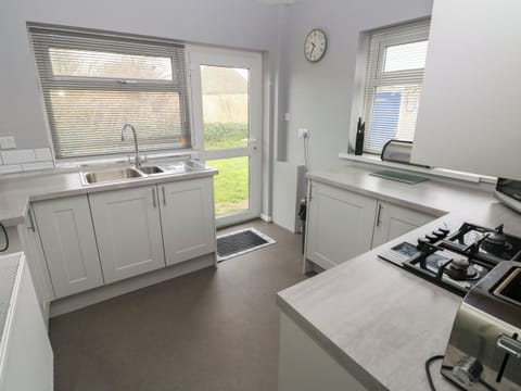 Fridge, electric kettle, toaster, cookware/dishes/utensils