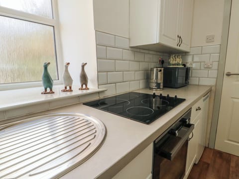 Fridge, electric kettle, toaster, cookware/dishes/utensils