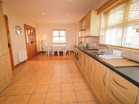 Fridge, dishwasher, electric kettle, cookware/dishes/utensils