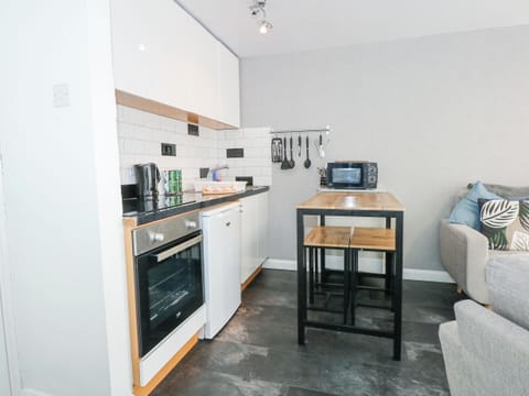 Fridge, electric kettle, toaster, cookware/dishes/utensils