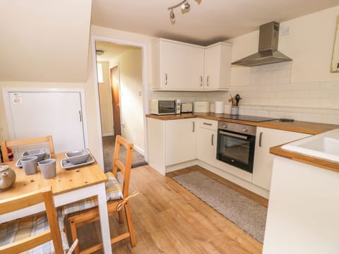 Fridge, electric kettle, toaster, cookware/dishes/utensils