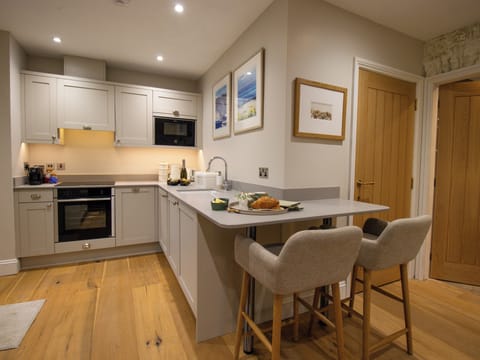 Fridge, dishwasher, electric kettle, cookware/dishes/utensils