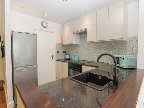 Fridge, dishwasher, electric kettle, cookware/dishes/utensils