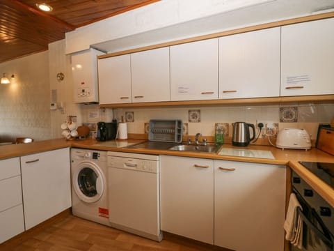 Fridge, dishwasher, electric kettle, cookware/dishes/utensils