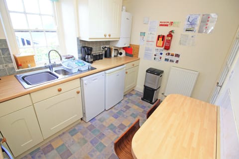 Fridge, dishwasher, electric kettle, cookware/dishes/utensils