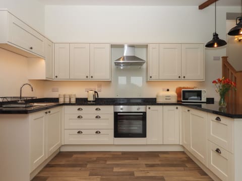 Fridge, electric kettle, toaster, cookware/dishes/utensils