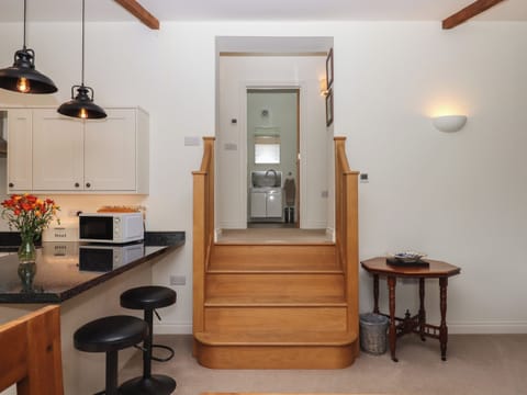 Fridge, electric kettle, toaster, cookware/dishes/utensils