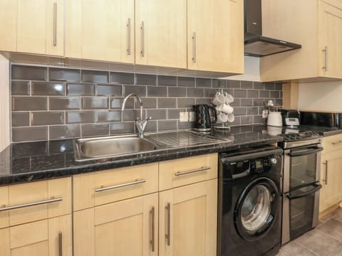 Fridge, electric kettle, toaster, cookware/dishes/utensils