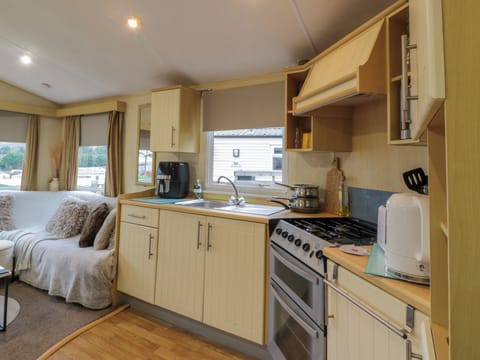 Fridge, electric kettle, toaster, cookware/dishes/utensils