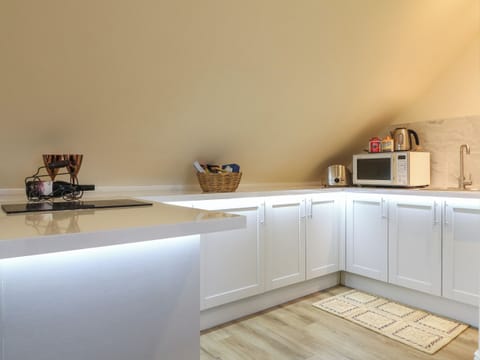 Fridge, electric kettle, toaster, cookware/dishes/utensils