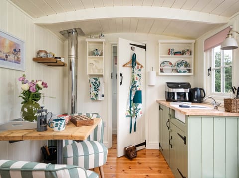 Fridge, electric kettle, toaster, cookware/dishes/utensils