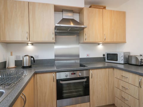 Fridge, electric kettle, toaster, cookware/dishes/utensils