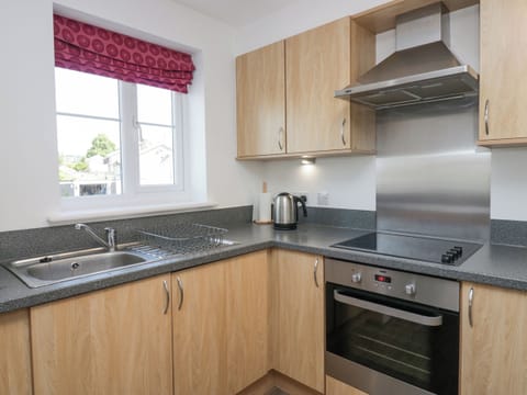 Fridge, electric kettle, toaster, cookware/dishes/utensils