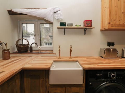 Fridge, electric kettle, toaster, cookware/dishes/utensils