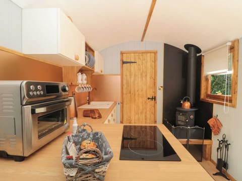 Fridge, electric kettle, cookware/dishes/utensils