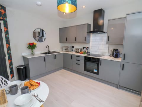 Fridge, electric kettle, toaster, cookware/dishes/utensils