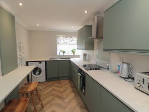 Fridge, electric kettle, toaster, cookware/dishes/utensils