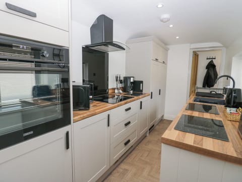 Fridge, electric kettle, toaster, cookware/dishes/utensils