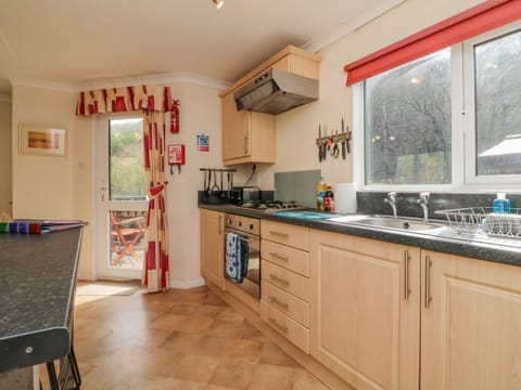 Fridge, electric kettle, cookware/dishes/utensils