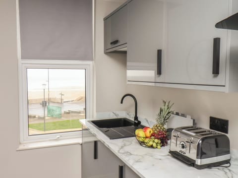 Fridge, electric kettle, toaster, cookware/dishes/utensils