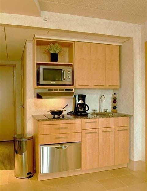 Suite, 1 King Bed and Queen Sofa Bed (Serenity Suite) | Private kitchenette | Fridge, microwave, stovetop, dishwasher