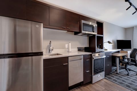 Suite, 1 Bedroom | Private kitchen | Full-size fridge, microwave, oven, dishwasher