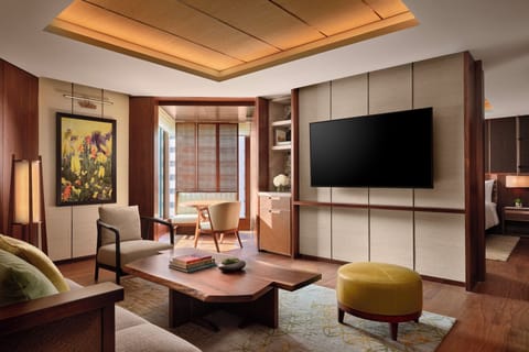 Presidential Suite, 1 King Bed | Living area | 65-inch TV with satellite channels